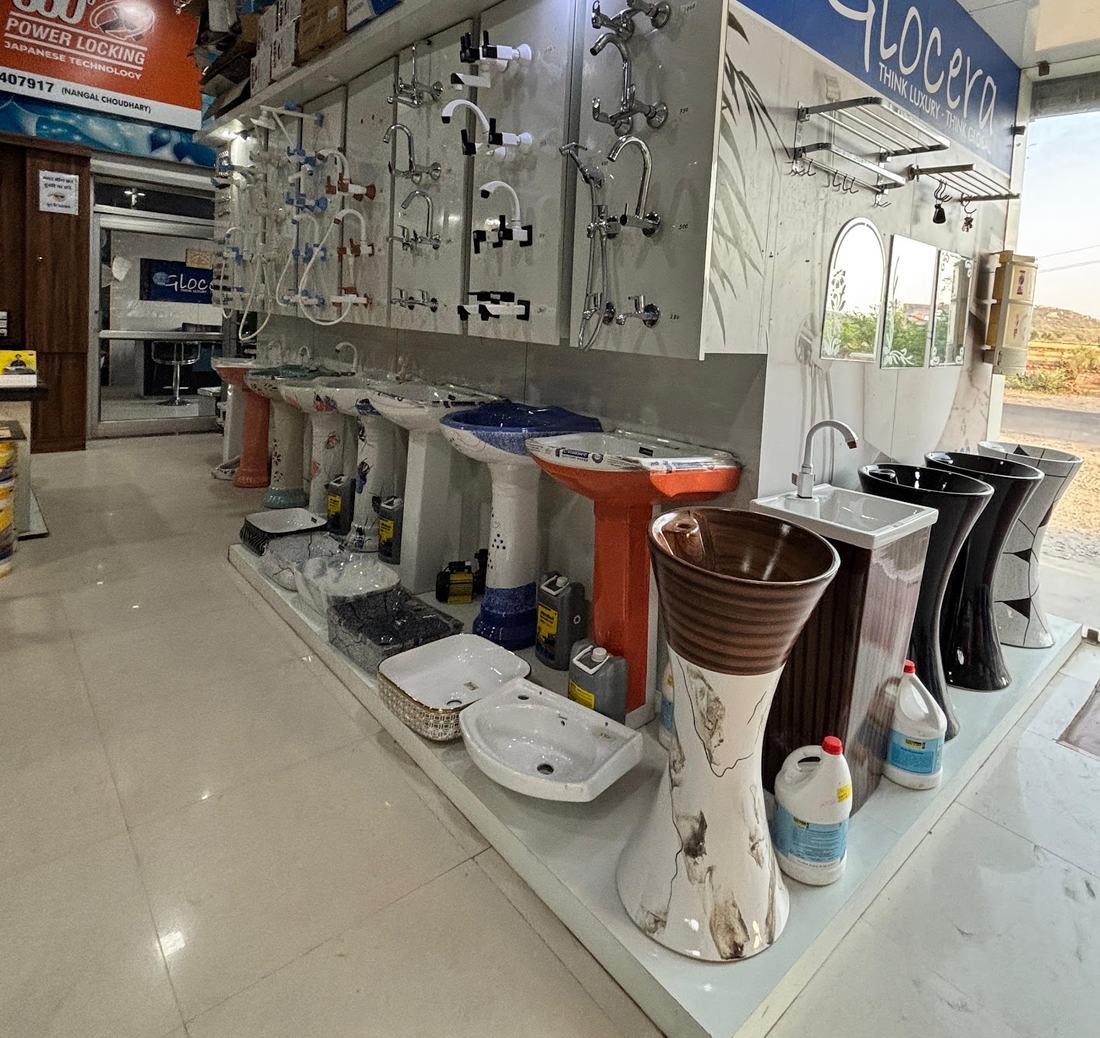 Wall of taps and showers above designer wash basins