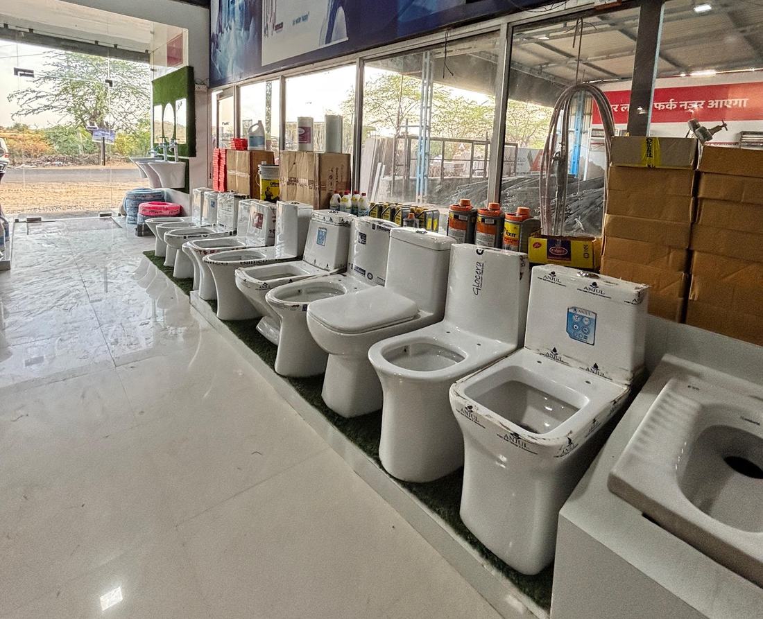 Row of western toilets on display