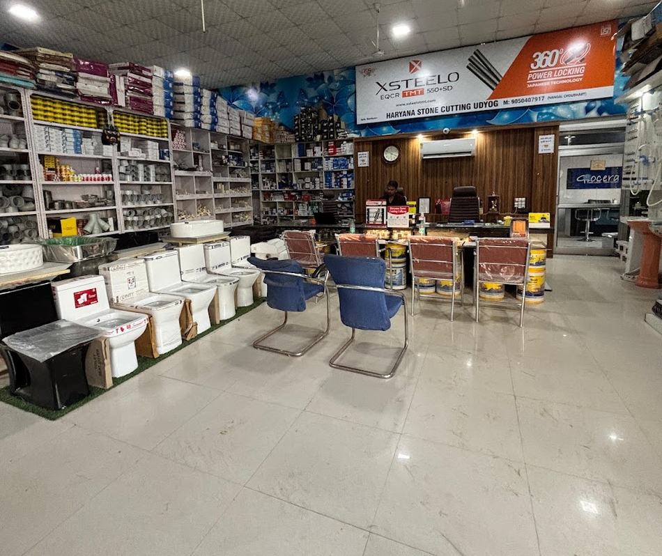 Showroom interior with sanitary display, pipe fitting shelves and the Xsteelo counter